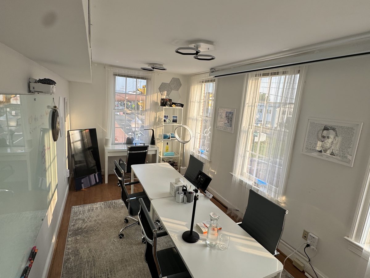 An intimate meeting space at The Hive set for a small-group conversation